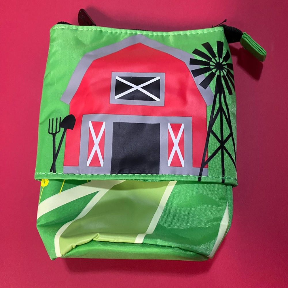 NWT HIDE AND PEEK POUCH